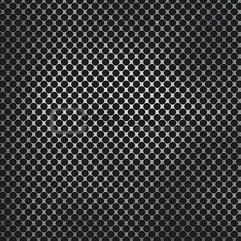 Perforated metal on carbon fibre background