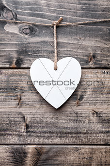 Love concept. Heart hanging on a string