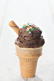 Chocolate ice cream in waffle cone 