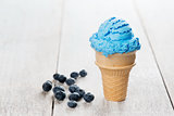 Blue ice cream in waffle cone