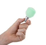 Hand holding an light bulb 