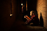 Buddhist novice reading