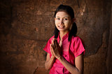 Young Myanmar girl blessing