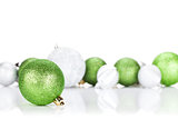 Green and silver christmas baubles
