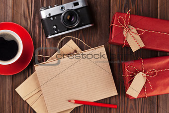 Gifts, camera, coffee and notepad