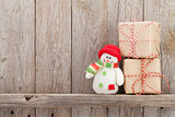 Christmas gift boxes and snowman toy