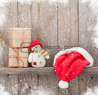 Christmas gift boxes, santa hat and snowman toy