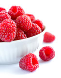 Big Pile of Fresh Raspberries in the White Bowl Isolated on White Background