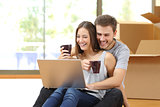 Couple buying online and moving house