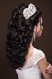 Beautiful brunette girl in image of Arab bride, wedding dress and crown on her head. Beauty face.
