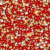 Vector pattern with gold hearts on red background