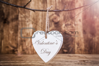 Love concept. Heart hanging on a string