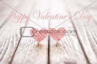 Small hearts on a wooden background