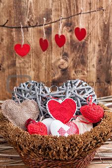 Many hearts inside a wooden basket