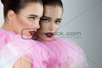 Beautiful girl in pink lace collar
