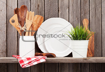 Kitchen cooking utensils on shelf