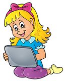 Girl playing with tablet