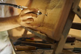 Sculptor Painter Artist Chiseling A Wooden Bas Relief