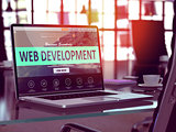 Web Development Concept on Laptop Screen.