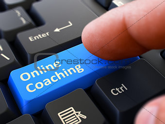 Online Coaching - Concept on Blue Keyboard Button.