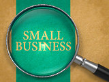 Small Business Concept through Magnifier.