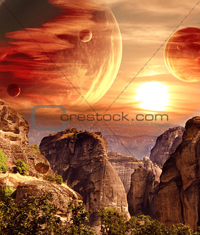 Fantastic landscape with planet, mountains, sunset