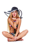 Girl in bikini and summer hat