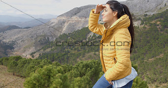 Young woman peering into the distance