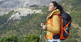 Young woman hiker enjoying the view