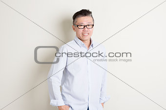 Portrait of mature Asian male people