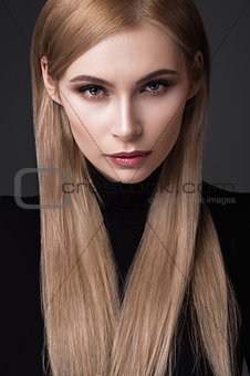 sexy  fashion model with long hair, young European attractive, beautiful eyes, full lips, perfect skin is posing in studio for glamour vogue test photo shoot showing different poses
