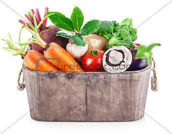Harvest vegetables in wooden basket