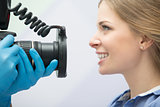Dentist with camera and patient