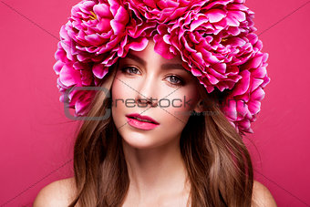 Flower style portrait of a young beauty