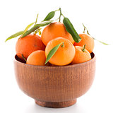 Tangerines on wooden  bowl 