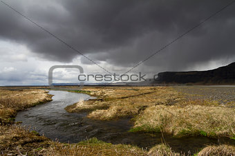 Dramatic panorama of a river in the South of Iceland