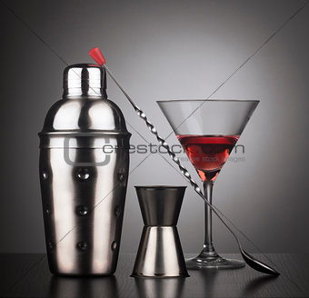 Drinks shaker with cocktail tools and glass