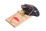 Modern computer mouse in a mousetrap