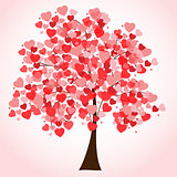 illustration of a tree covered with hearts.