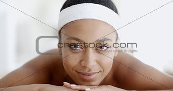 African Woman Laying On Spa Table