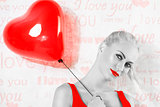 BW shot , of sexy blonde girl with red heart balloon