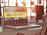 SEO Reports Concept on Laptop Screen.
