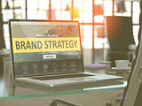 Laptop Screen with Brand Strategy Concept.