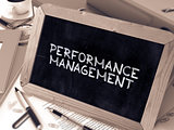 Performance Management Concept Hand Drawn on Chalkboard.