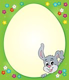 Egg shaped frame with lurking bunny 1