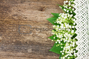 Lilly of valley on wood