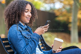 African American Teenager Woman Drinking Coffee and Texting