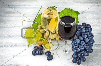 Wine in wineglass with grapes