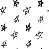 Stars painted imitation of ink on a white background seamless pattern