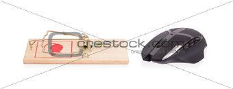 Modern computer mouse in a mousetrap